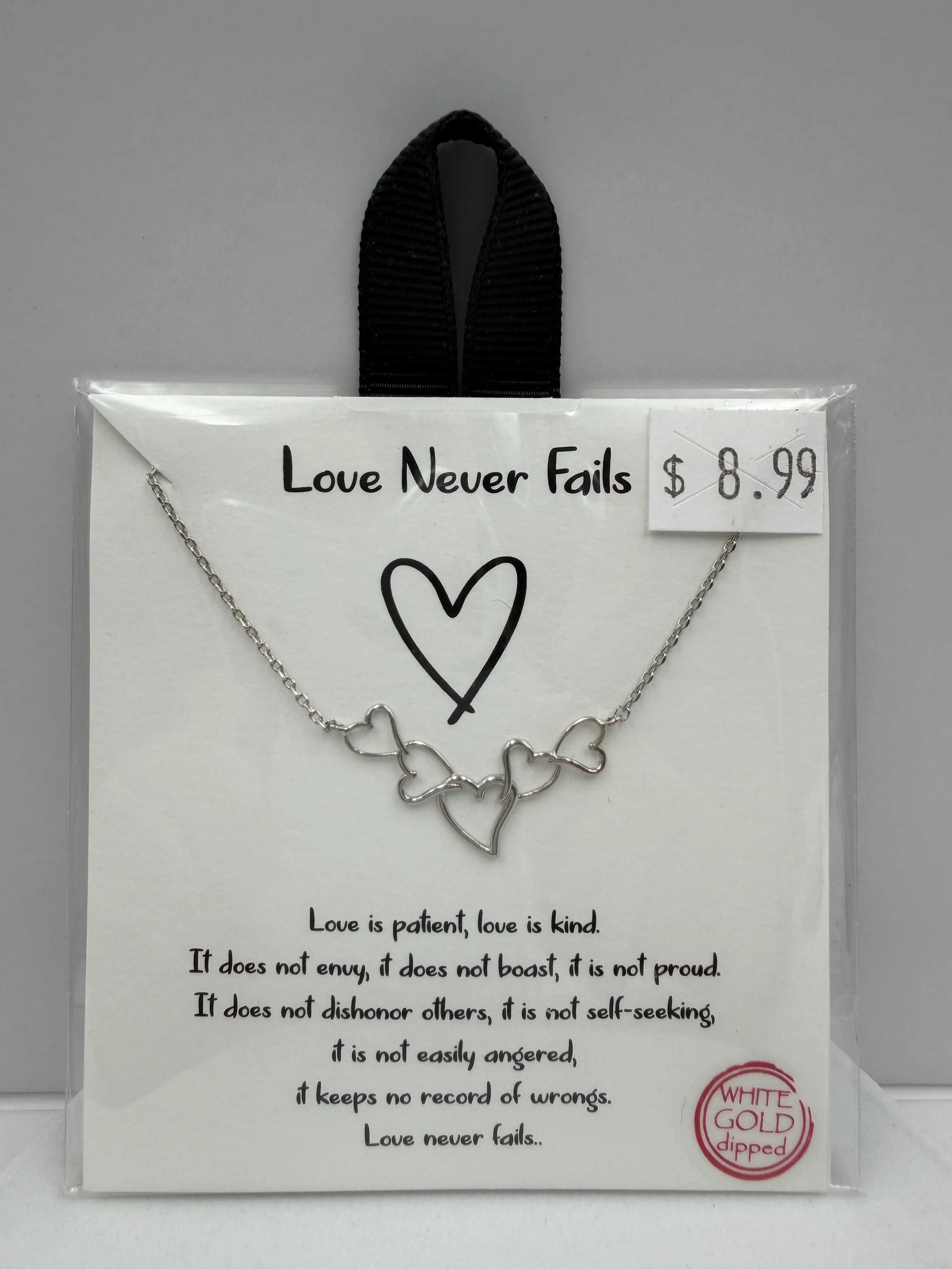 "Love Never Fails" White Gold Dipped Necklace